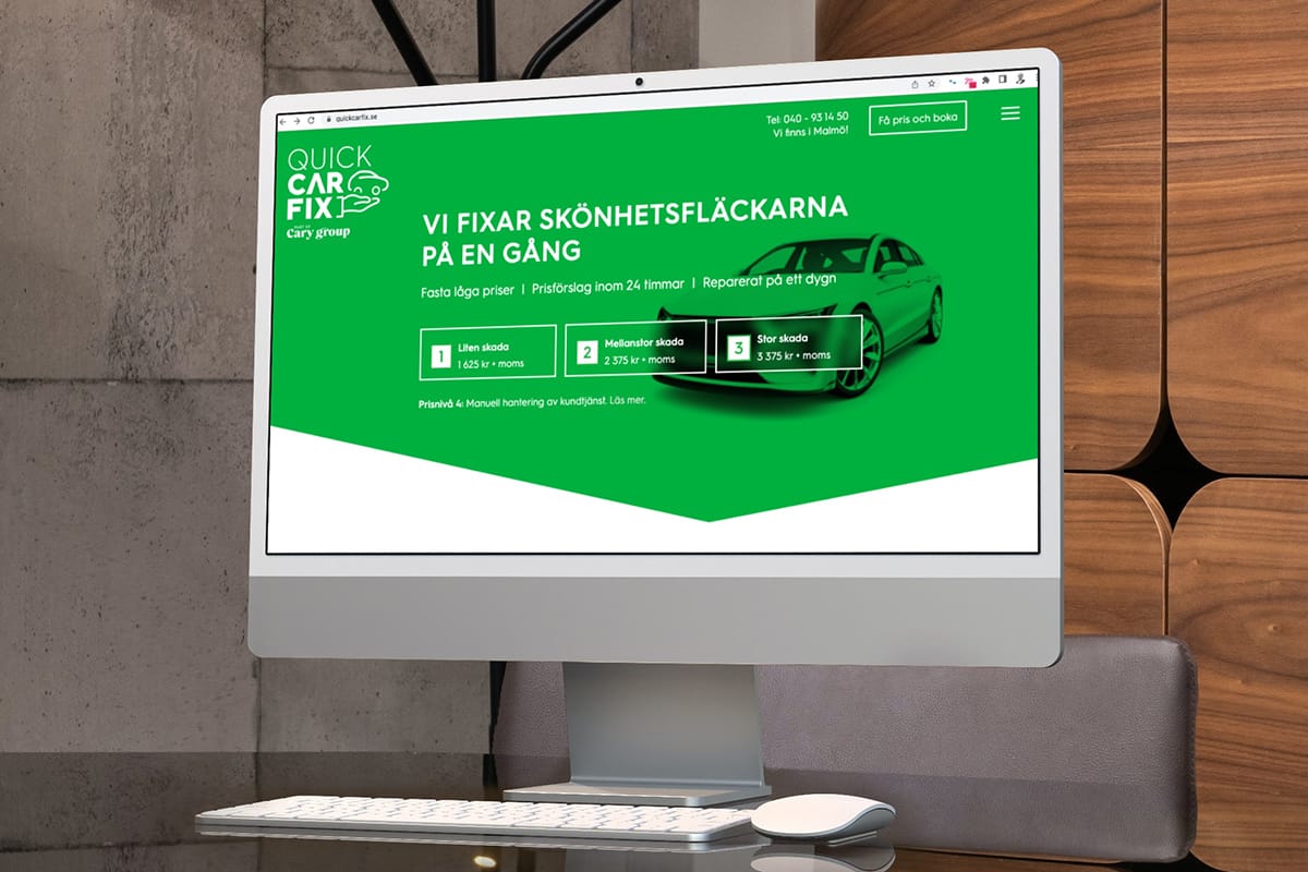 En dator med Quick Car Fixs webbsida